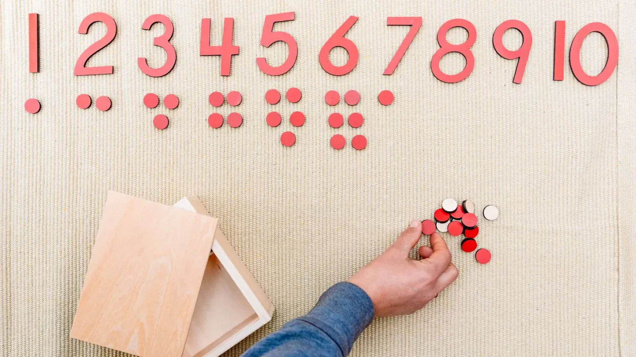 Child working with Montessori Cards and Counters Math material
